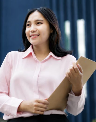 Student holding study notes