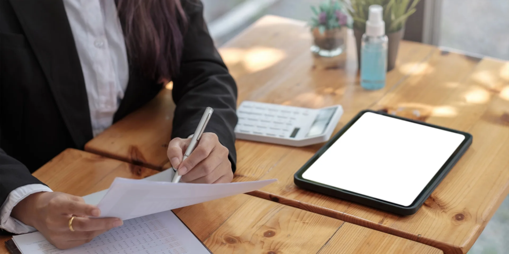 Iab accounting cpd hero Professional reviewing documents with a tablet